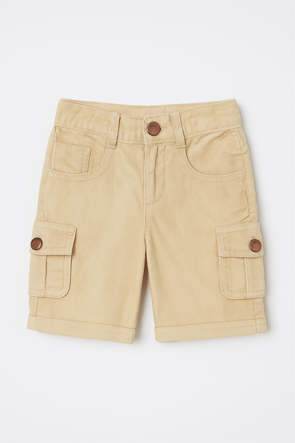  Beige corduroy boys' cargo half pants hanging on a wooden hanger against a white background. The shorts feature front pockets, buttoned flap side pockets, a waistband with belt loops, and a front button closure.