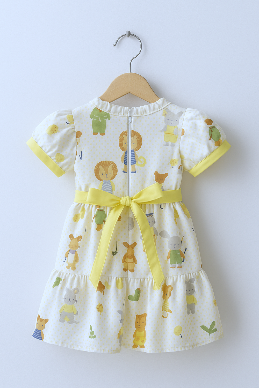 A baby girl in a colorful dress and shoes stands before a lion, embodying a sense of wonder and exploration. Back side