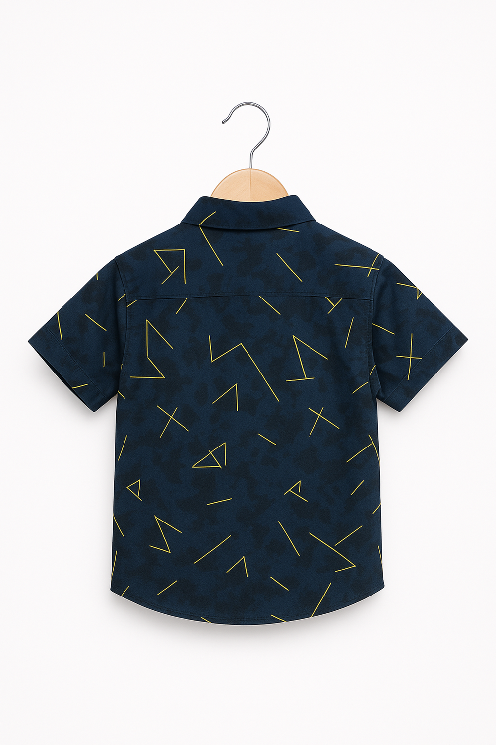 Back view of a boy’s half-sleeve club collar shirt in navy blue with playful yellow geometric patterns. Displayed on a wooden hanger against a clean white background, highlighting the design and cut.