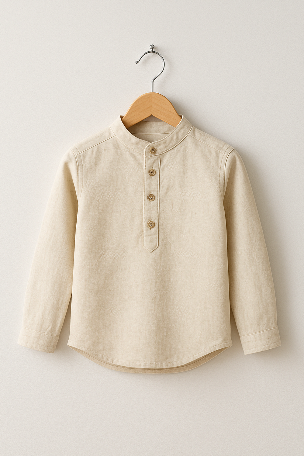 A Dull Off white kurta with wooden buttons neatly displayed on a wooden hanger against a plain background for product showcase.